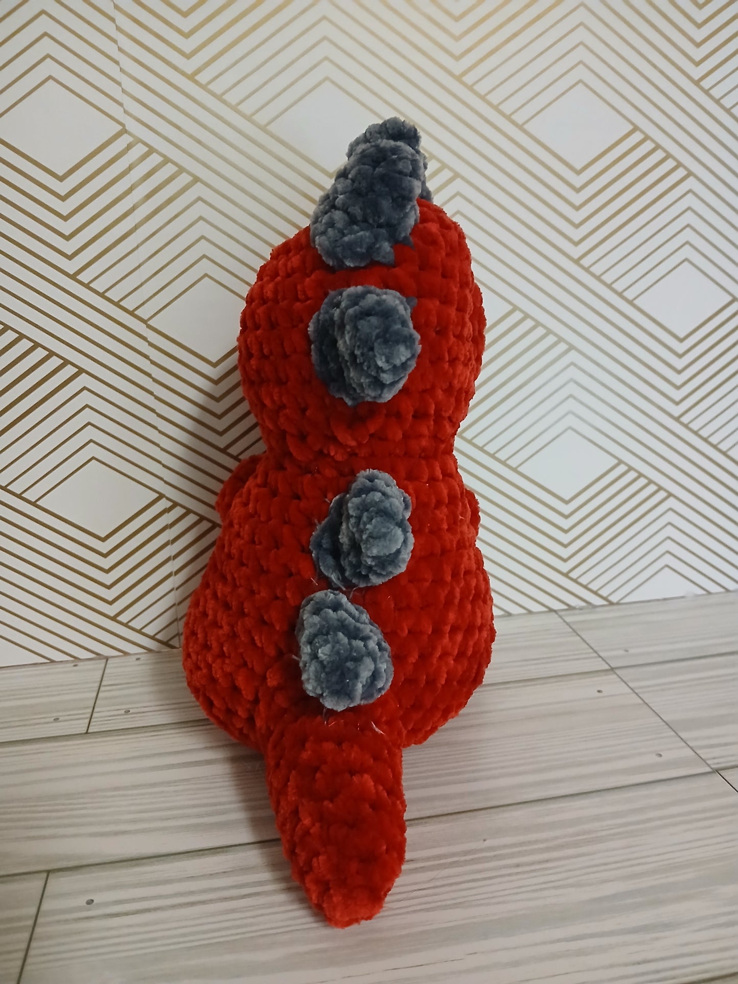 Red Dinosaur with Grey Spikes